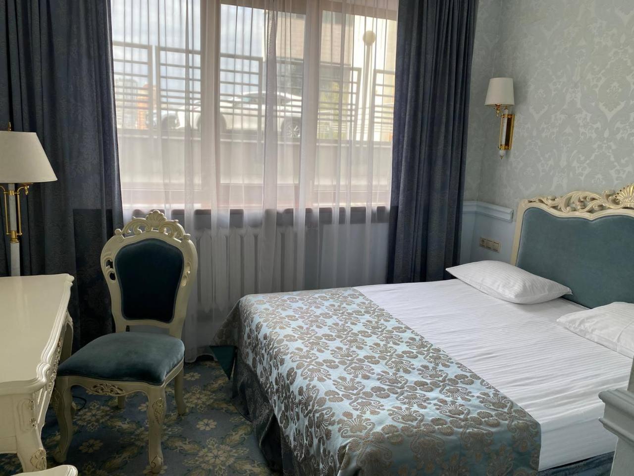 Royal Olympic Hotel Kyjev Pokoj fotografie